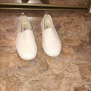 White slip on shoes
